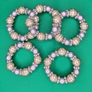 Set of 5 unbranded  super cute dining napkin rings.